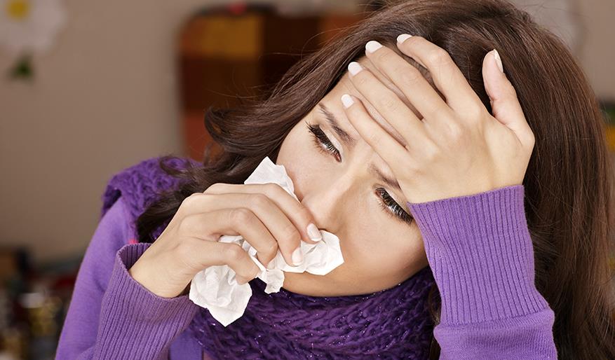 image of woman with flu symptoms