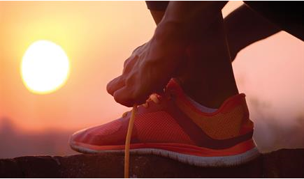 image of man preparing to jog during Ramadan