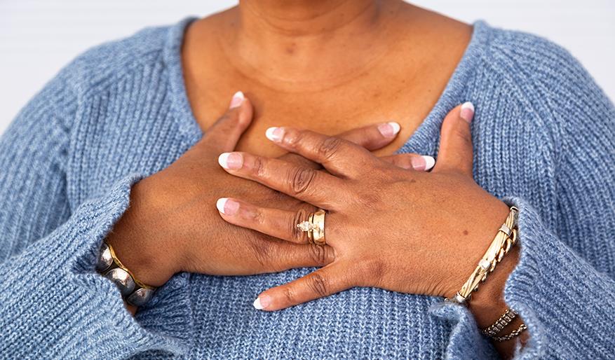 image of a woman having heartburn